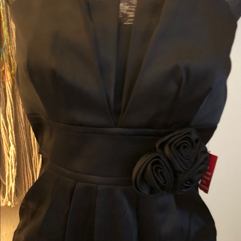 Elegant Black Dress with Floral Detail